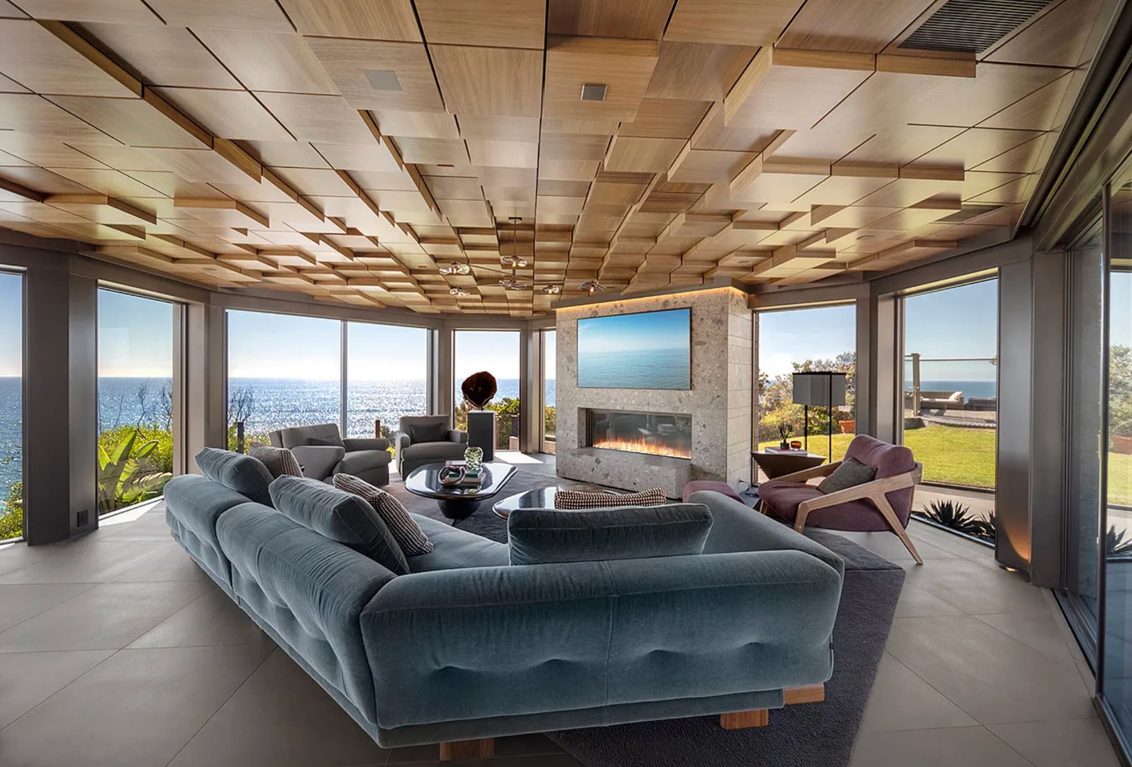 Luxury smart home living room in Newport Beach featuring integrated home automation, ambient lighting control, and premium audio visual systems at dusk